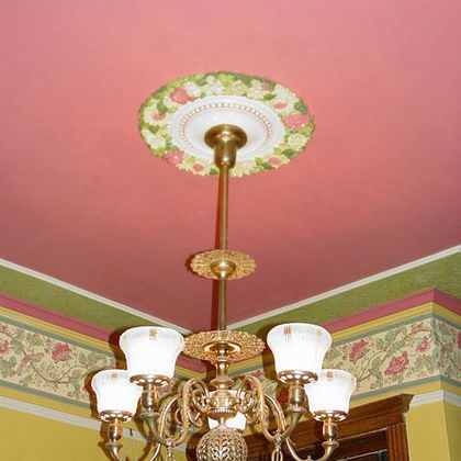 Compound cornice with painted wall borders