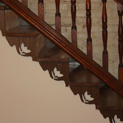 Scroll saw carved stair brackets