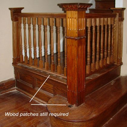 stair landing renovation with newel and gate