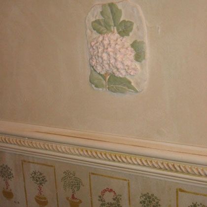 stencils on aged plaster and plaster insets