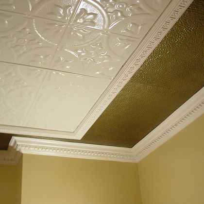 Compound cornice with hammered tin filler